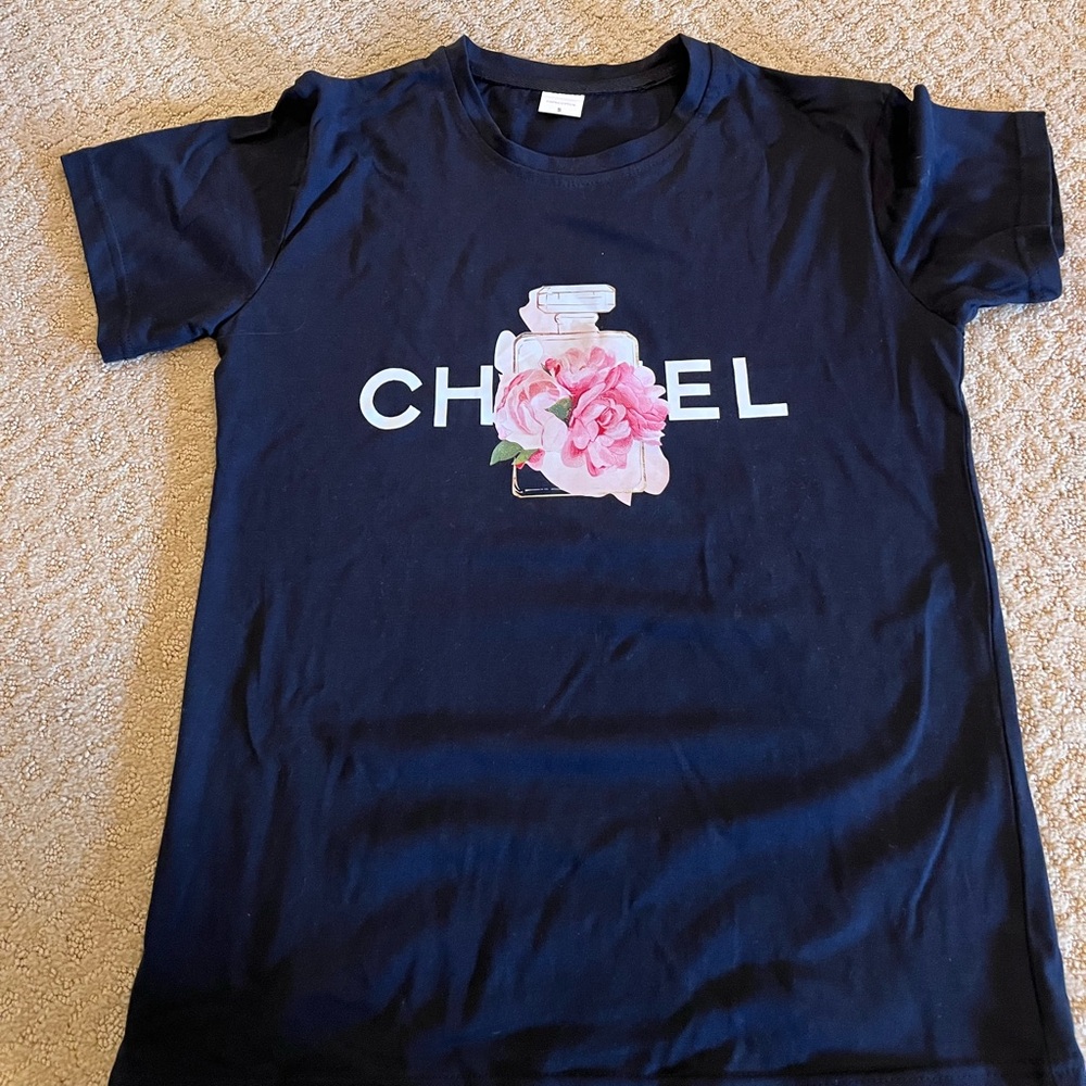 New Woman’s black tee shirt size small!